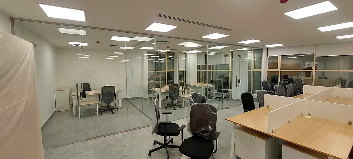 Open-plan office with glass partitions