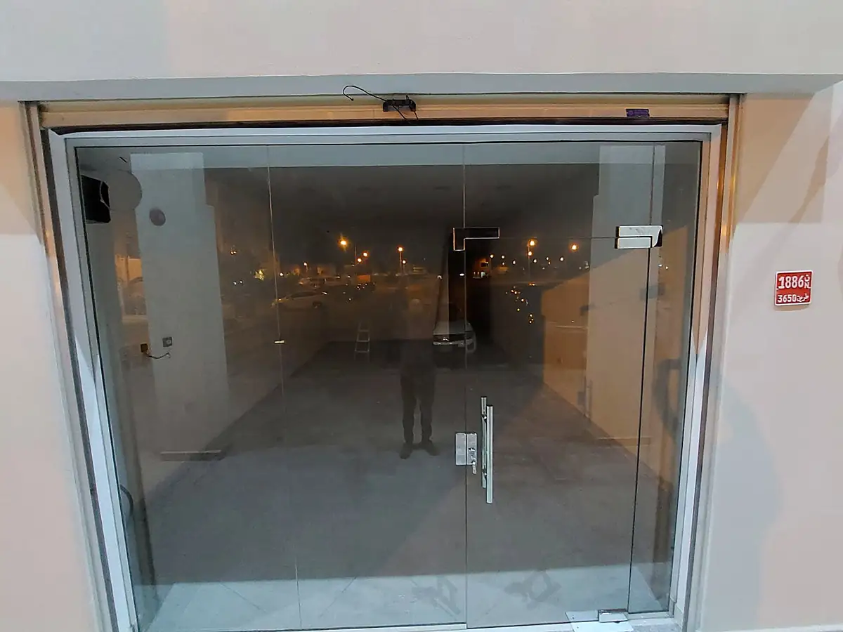 Frameless glass shopfront entrance